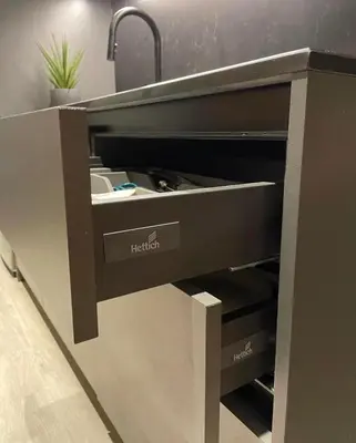 a kitchen counter with a sink and a drawer at SATELUXXE CAVE SHORE 3 in Manila