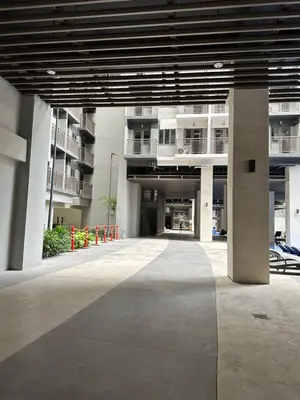 an empty parking lot in a large building at Mall of Asia MOA S Residences , IKEA Pasay , NAIA Airport , Manila Bay in Manila