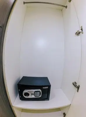 a radio sitting on a shelf in a mirror at Book Now for Free Pool And Sauna Access Inside Prime Location Of Manila near US Embassy, NAIA, Makati, BGC, Mall of Asia, Chinatown. Immerse in Sea View Balcony for Limited Time Offer This Month Click Here Now in Manila