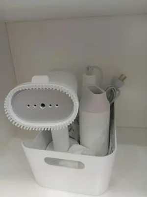 a white container with a sink and toiletries at Condo near MOA Pasay and NAIA Manila Airport in Manila
