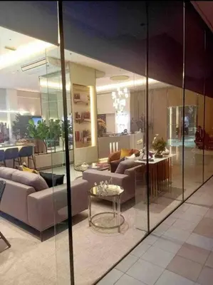 a lobby with couches and a table in a building at Milia Condo w/ Free use of Swimming pool & Gym in Manila