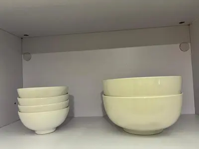 two large white bowls sitting on a wall at Comfty, Chic & Spacious Room with Parking & WiFi in Manila