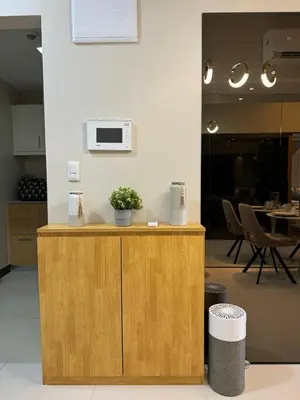 a kitchen with a counter with a plant on it at Staycations Up Above 14 @ BGC 1BR in Manila