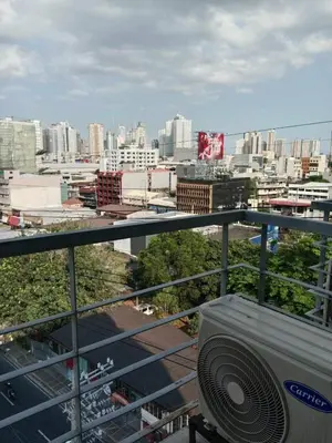 a view of a city from a balcony at Dian SUITES 1 in Manila