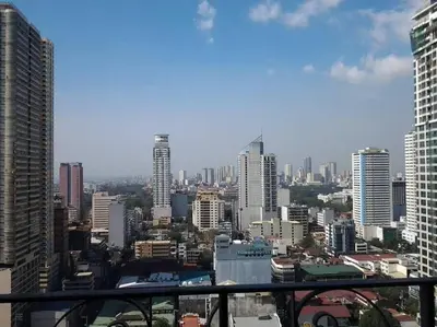 a view of a city skyline with tall buildings at Long term Rental of 2 BR Condo @Malate, Manila (opp Robinson Place Mall) in Manila