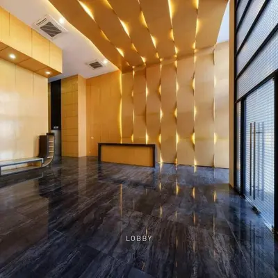 an empty room with a wall with lights on it at Long term Rental of 2 BR Condo @Malate, Manila (opp Robinson Place Mall) in Manila