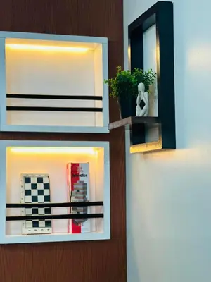 a room with a mirror and a plant on a wall at Mon ciel suite Spacious 1BR Air Residence SMDC in Manila