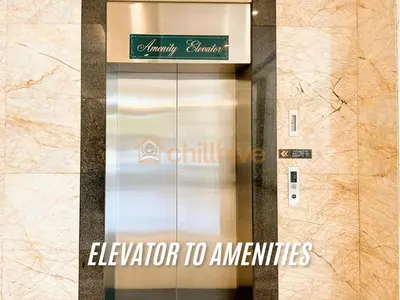 a elevator door with the words elevator to apartments at Luxury BGC Condo, Venice Grand Canal #vlrtc5h in Manila