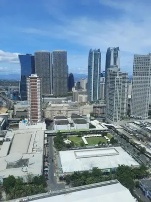 an aerial view of a city with tall buildings at SMDC Fame Marcelle's Place near Mega Mall in Manila