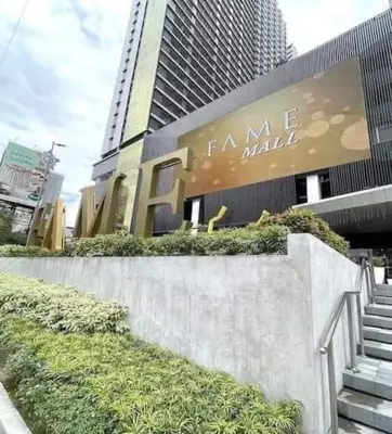 a building with a sign that reads fam me mall at 1BR w/ Balcony near Megamall: The Admiral‘s Lounge in Manila