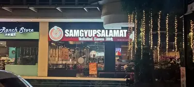 a restaurant with a sign on the front of it at 1 bedroom Condotel near Terminal3 Airport in Manila