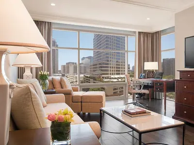 a living room with a view of a city at Discovery Primea in Manila