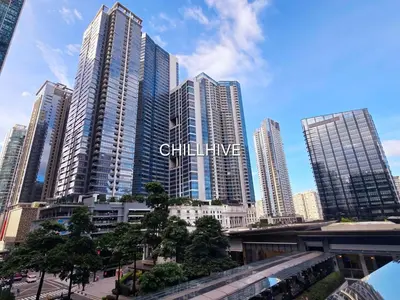 a group of tall buildings in a city at Cozy Bgc Stay Near Uptown Mall & Hyatt #ournw24l in Manila