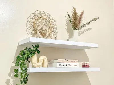 a white shelf with books and a plant on it at Bgc Prime, Near Uptown Mall, Grand Hyatt #ournw7m in Manila