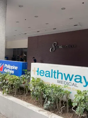 a sign in front of a healthcare hospital at Condo in Ermita near UP-PGH, St Lukes & US Embassy in Manila