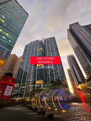 a view of two tall buildings in a city at Upscale Bgc Experience 1br Condo #oursw17c2 in Manila