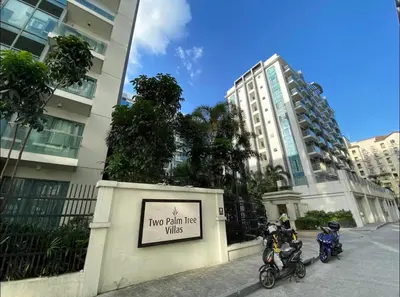 two motorcycles parked in front of a building with a sign at Runway Walk Studio - Near NAIA Terminal3 in Manila