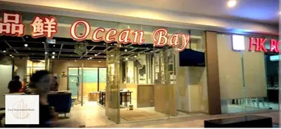 a store with a sign for an ocean bay at New York Suite - by GUEST RESERVATION'S MANILA in Manila