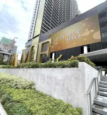 a building with a sign that reads fame mall at Fame Residences 1 bedroom near MRT, Shaw, Megamall, Shangrila, Ortigas 1401 in Manila