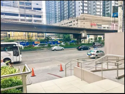 a view of a city street with cars on the road at Urban Deca EDSA Budget Place w/ Unli Wi-Fi Netflix in Manila