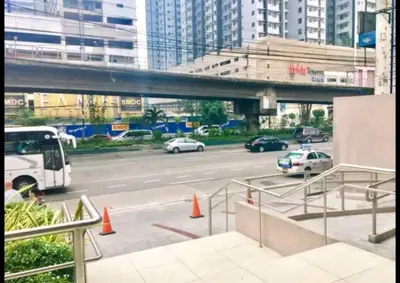 a view of a city street with cars and traffic cones at Urban Deca EDSA Staycation w/Unli Wi-Fi & Netflix in Manila