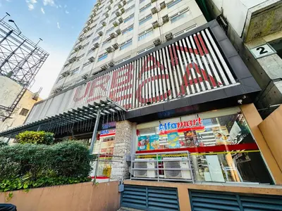a store front of a building with a large building at Urban Deca EDSA Staycation w/Unli Wi-Fi & Netflix in Manila