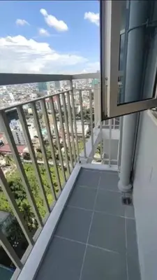 a balcony with a view of a city at COAST RESIDENCES in Manila