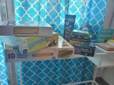 a table with boxes on top of it at COAST RESIDENCES in Manila