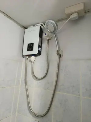 a shower in the corner of a bathroom at Pacific Regency, Manila studio type with balcony in Manila