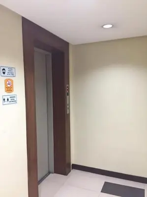 an empty room with a door and a hallway at Spacious Studio Apartment B304 in Manila