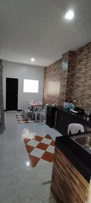 a room with a kitchen with a table and chairs at 11 Guest - Unit 3 in Santa Rosa
