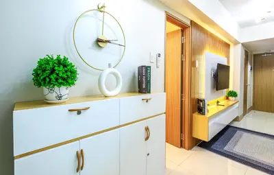 a bathroom with white cabinets and a mirror at Amazing Condo Unit Shore 3 - walking distance to MOA - Pasay - 2 Beds - with 1 extra bed in Manila