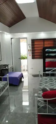 a bedroom with two bunk beds in a room at 25 Guest - Unit 1,2&3 - 2 units Bungalow and Studio type in Santa Rosa