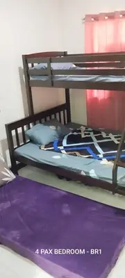 a couple of bunk beds in a room at 25 Guest - Unit 1,2&3 - 2 units Bungalow and Studio type in Santa Rosa