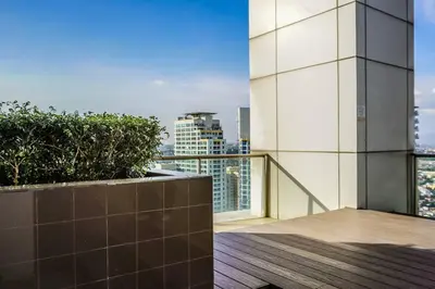 a balcony with a view of a city at New Modern Luxurious 2Bedroom in Eastwood in Manila