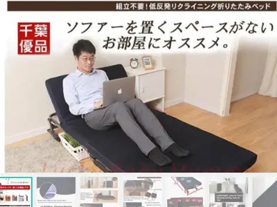 a man sitting in a chair with a laptop at Condo in Makati studio type fast wifi Netflix in Manila