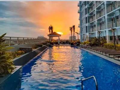 a pool at a resort with a gazebo at Caine's Cabin 27th Feel our Love and Warmth Welcome in Manila
