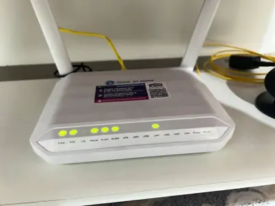 a laptop computer sitting on top of a table at Casa Dona Suites at SMDC Charm Residences in Manila