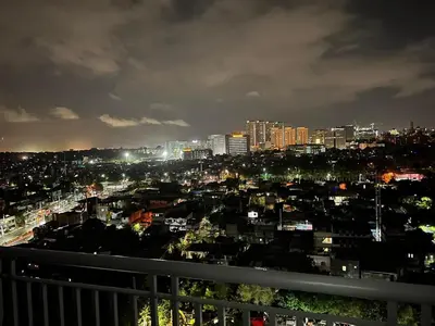 a view of a city at night at Suite 2253 in Manila