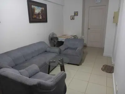 a living room with two couches and a table at Sorrel Residences- 2 Bedroom Apartment in Manila