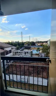 a view of a city from a balcony at HeRo's Lair - Staycation near EK with Ps4 & more! in Santa Rosa