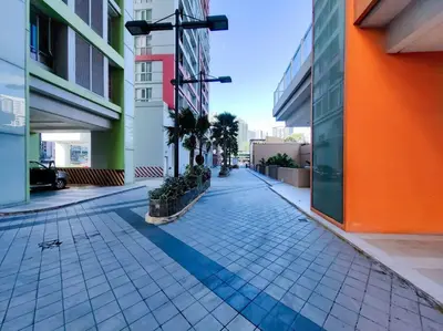 an empty street in a city with buildings at 1BR Condotel Suite at Sunshine100 City Plaza #SS05 in Manila