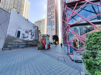 a street in a city with tall buildings at 1BR Condotel Suite at Sunshine100 City Plaza #SS03 in Manila