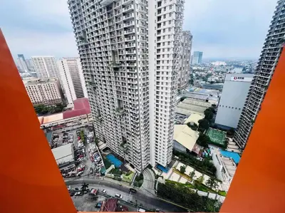 an aerial view of a city with tall buildings at 1BR Condotel Suite at Sunshine100 City Plaza #SS04 in Manila