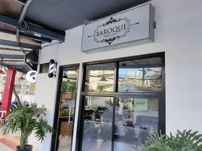 a sign on the front of a restaurant at 1BR Condotel Suite at Sunshine100 City Plaza #SS04 in Manila