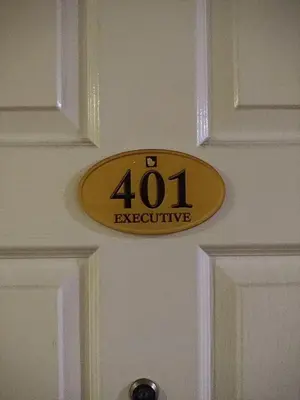 a sign on a door with the number at Hotel Sogo Recto in Manila