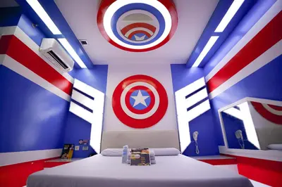 a room with a captain america room with two beds at Astrotel Divisoria in Manila
