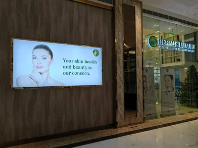 a sign on the side of a building at 1BR Condotel with Balcony at FAME Residences #FM31 in Manila