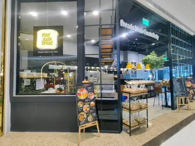 a bakery shop with a display window with pastries at 1BR Condotel with Balcony at FAME Residences #FM38 in Manila