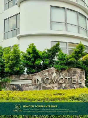 a novation sign in front of a building at Novotel Tower at Mandaluyong Rockwell View in Manila